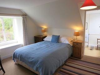 large doble bedroom looking west