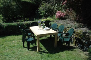 garden with BBQ and furniture for dining
