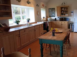 large kitchen with table