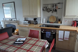 kitchen with table for 4 guests