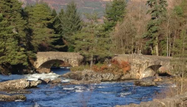 multi-arched stone bridge by Falls of Dochart