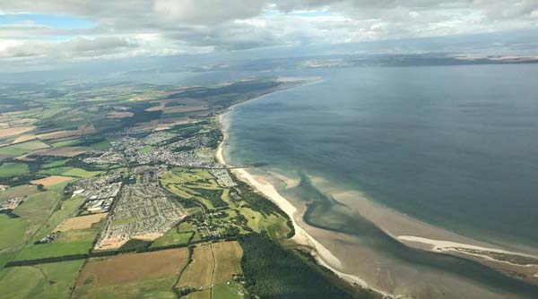 aerial view of coast and sandy beach at Hairn