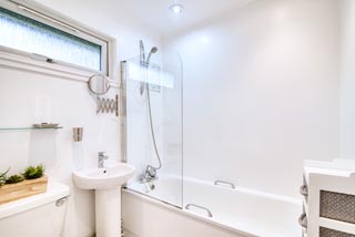 bathroom with shower overhead