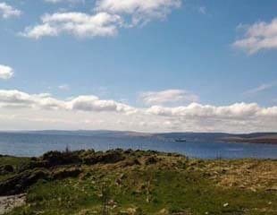 sea view with ferry in the distance