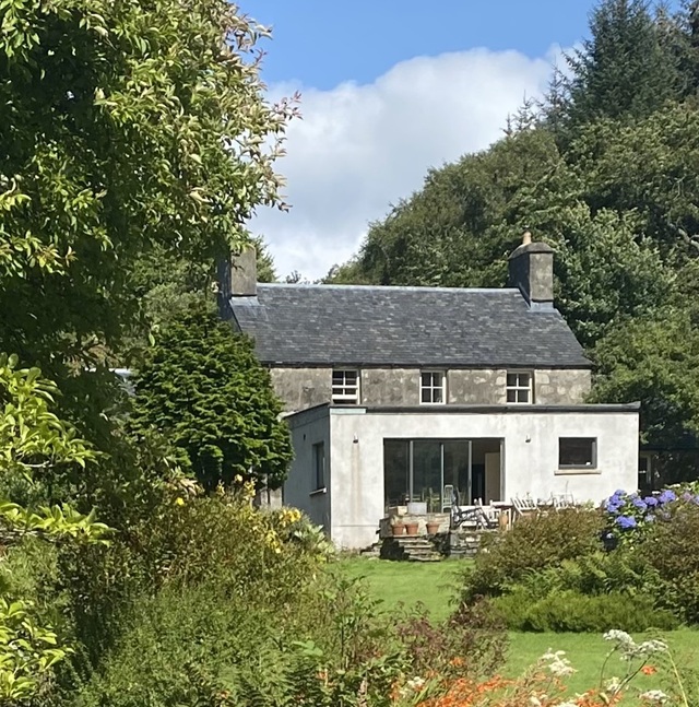 Dounie House with door opening onto garden