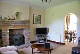 culzean house sittingroom with wood burningstove