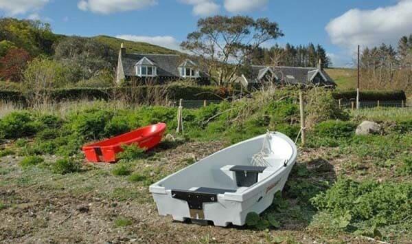 boats outside the farmhouse