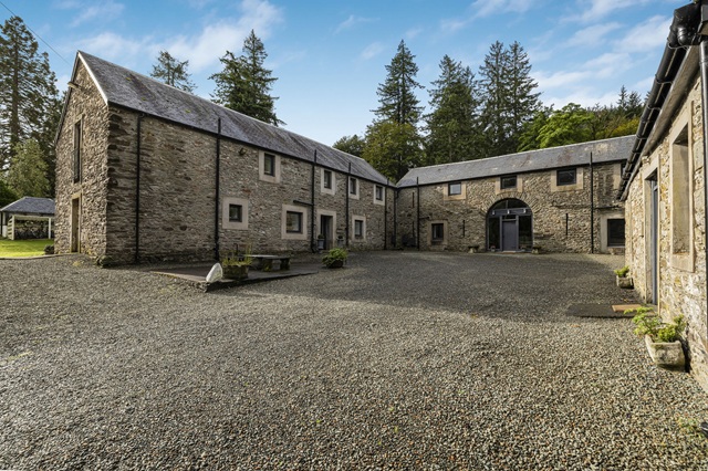 house with tennis court