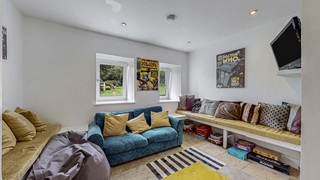 sitting room with cinema tv