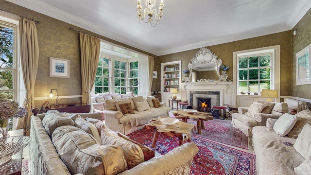 sitting room with roaring fire