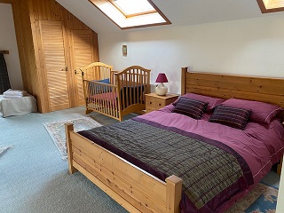 family bedroom with cot