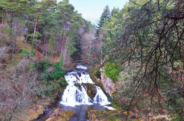 walking by waterfall in Deeside