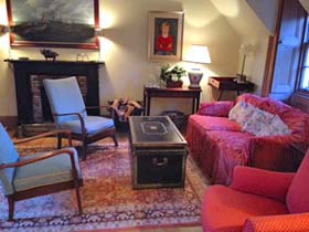 sitting room with log fire