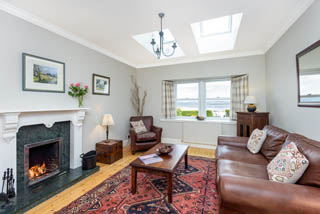 sittingroom with real log fire