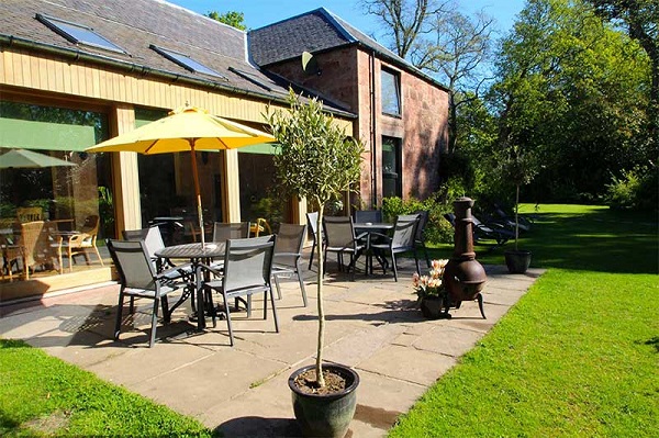 dining on patio in garden