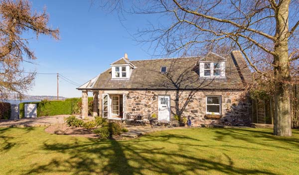 holiday cottage over looking river