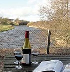 relax in garden overlooking river