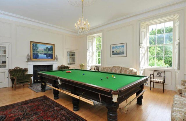 billiards table in games room