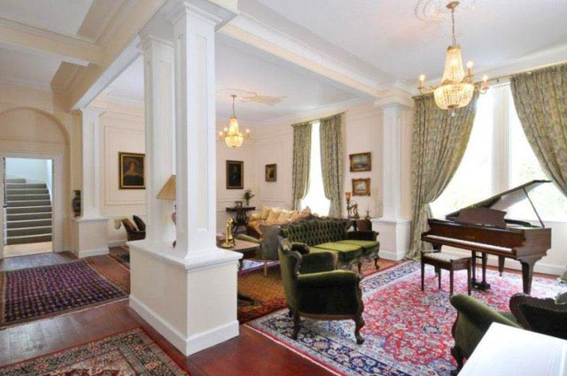 sitting room with grand piano