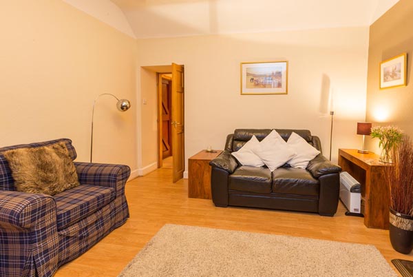 sitting room with leather sofas