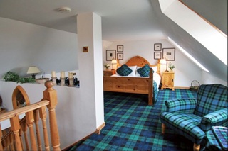 bedroom with galleried ceiling