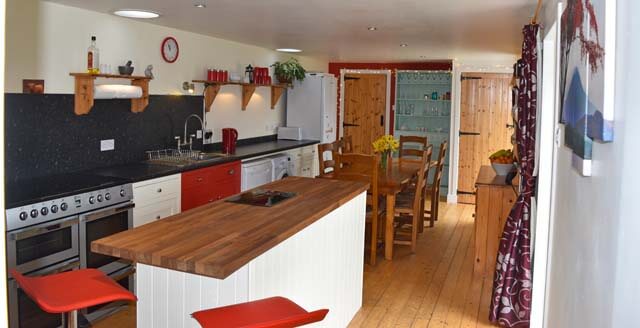 dining kitchen with woodburning stove