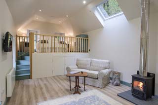 Luxury sitting room with wood burning stove