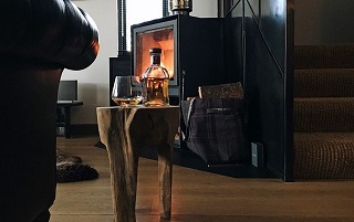 cozy log fire in wood burning stove