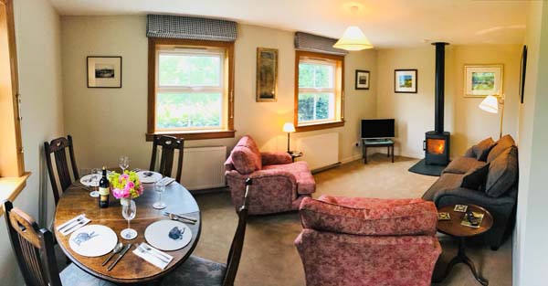 sitting room with real fire in wood burning stove