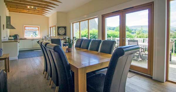 dining area with views over loch to mountains