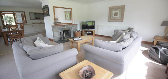 sitting room with view over Loch Tay