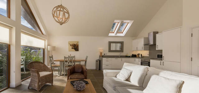 sitting room with view over Loch Tay