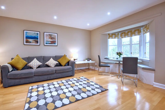 large dining table in bay window