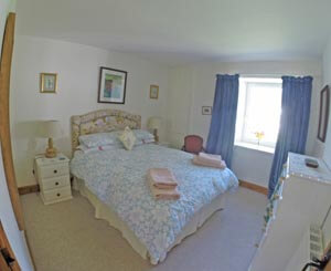 master bedroom with kingsize bed