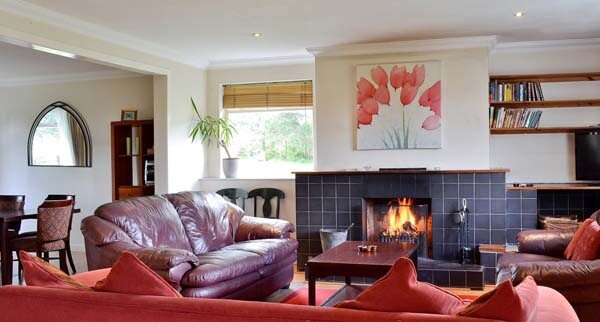 group accommodation with log fire