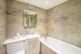 bathroom with shower overhead